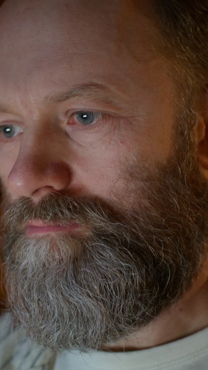 Close-up portrait of a man with a beard