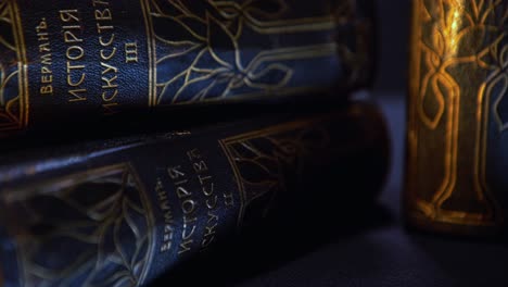 antique books on a dark background