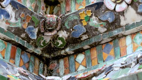 close-up of ornate temple mosaics in bangkok