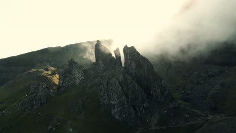 misty scottish highlands rock formations