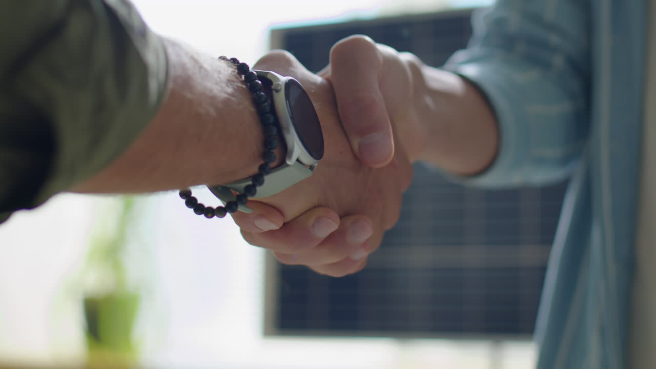 Handshake of Two Renewable Energy Engineers