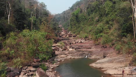 Dry-Song-Sa-Waterfall-at-the-Thakhek-loop-during-day-time,-aerial