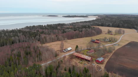 Aerial-view-of-Swedish-rural-landscape-in-late-winter