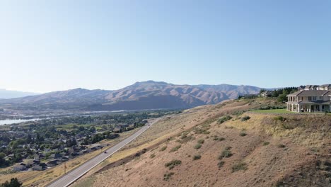 highway near wenatchee, washington, usa and cascade range in background aerial