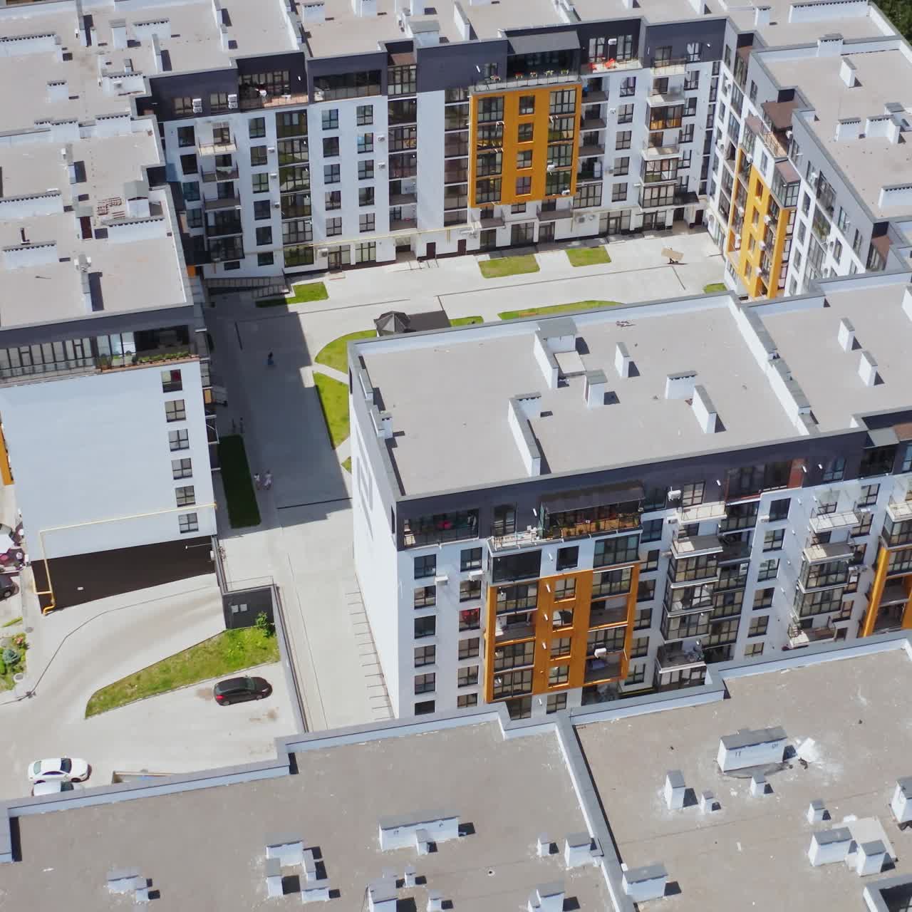 Contemporary apartments in the city complex. Modern residential area with multi-storey buildings. New tall housing apartments. Aerial view