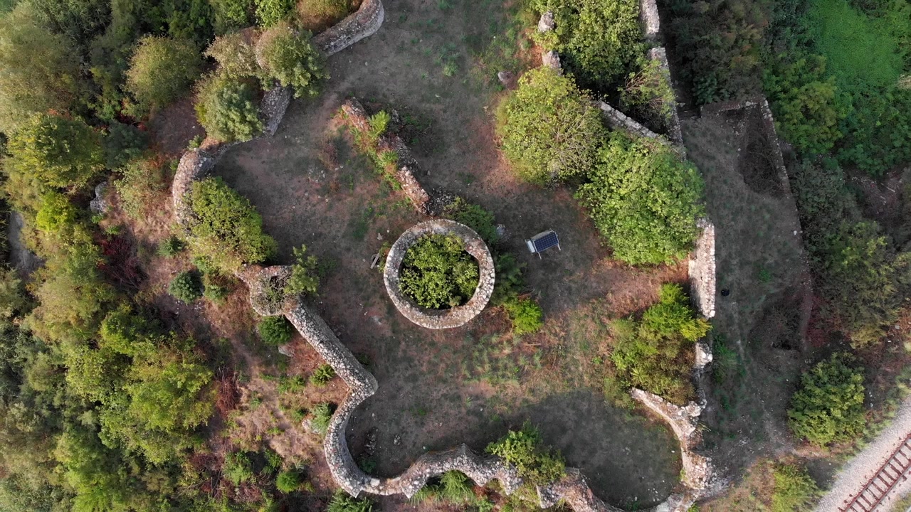 Aerial: Lesendro Fortress in Skadar Lake in Montenegro. Zenital shot going up