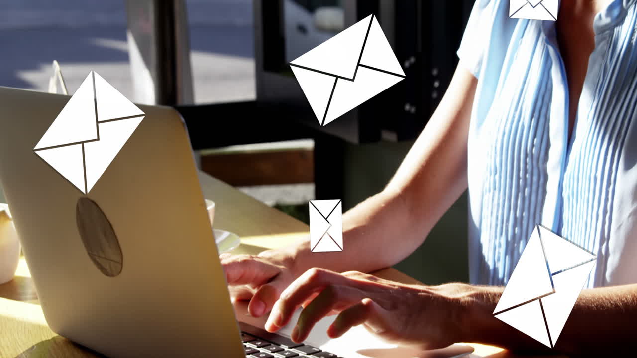 Woman typing emails on a laptop 4k