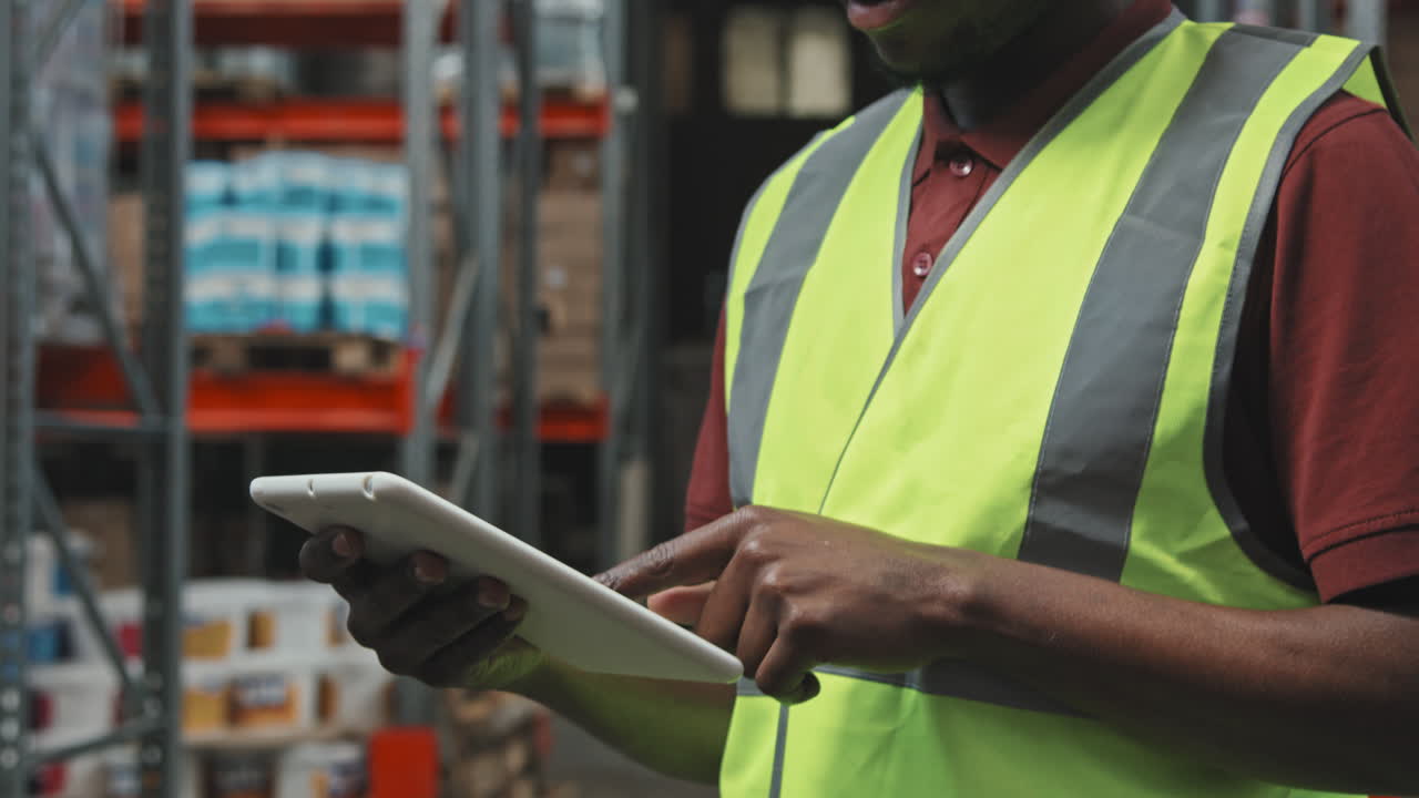 Warehouse Worker Looking at Camera