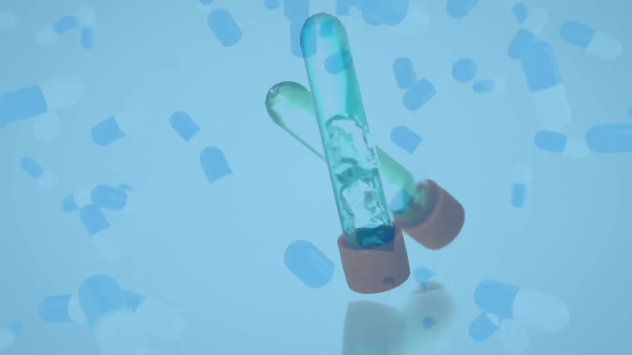 전면에 태블릿이 있는 시험 튜브가 떨어집니다.