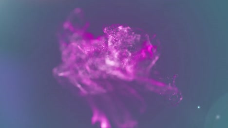 animation of glowing pink particle cloud over colourful defocused lights moving on black background