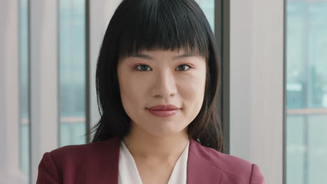 portrait asian business woman smiling looking confident independent female in office executive enjoying successful career in corporate leadership company manager at work