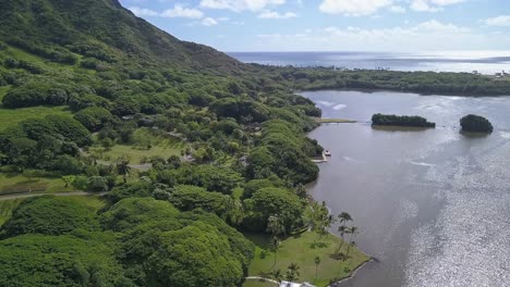 aerial view of moli'i pond next to ko'olau mountain in oahu hawaii