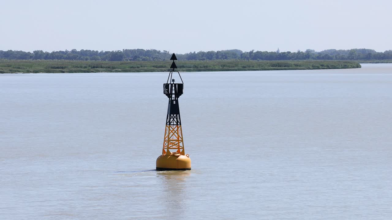 Buoy floating in calm water near Blaye