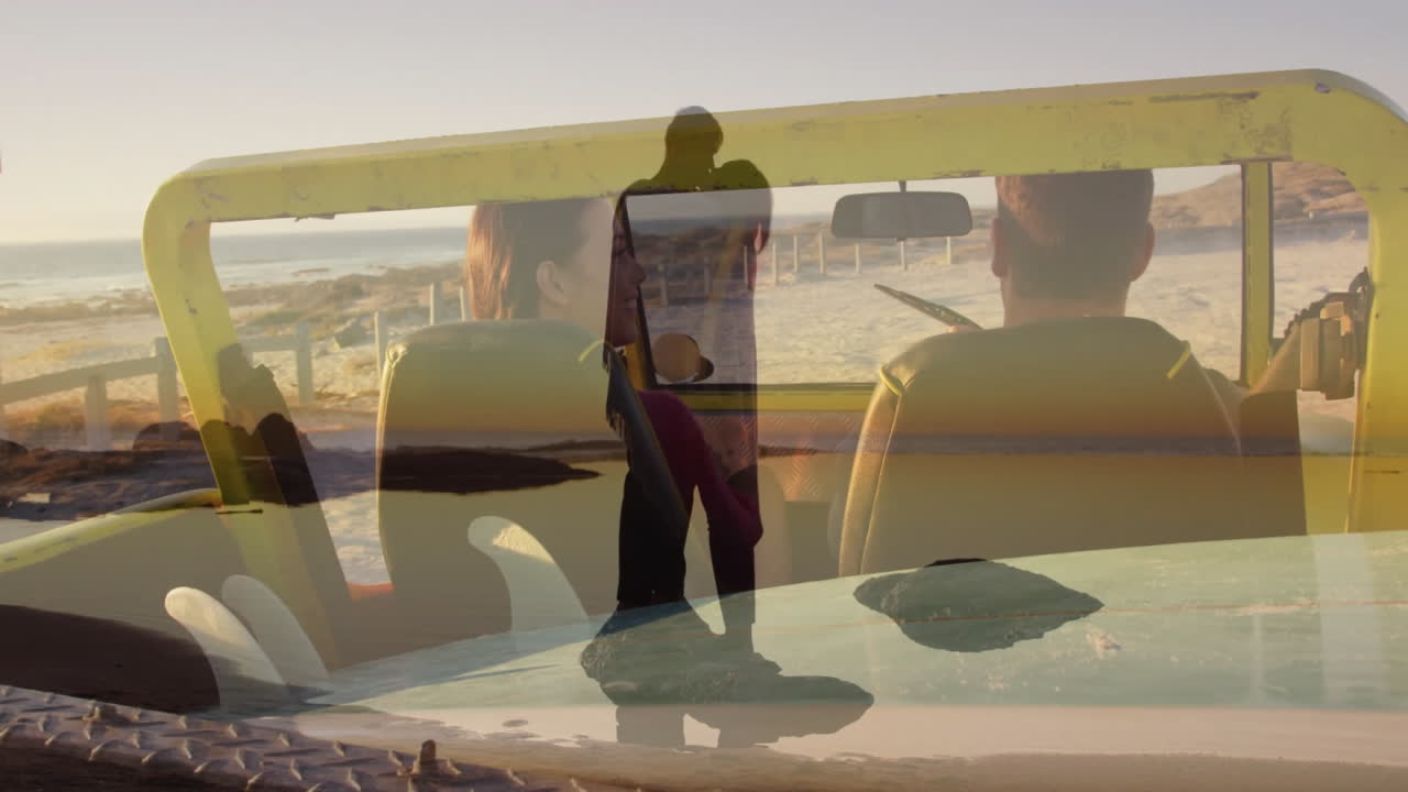 Driving convertible along beach, couple walking on sand with animation overlay