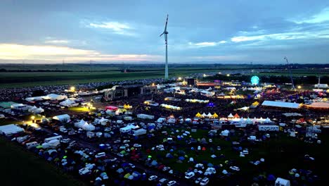 nova rock festival with music stage and crowd of people in pannonia fields ii, nickelsdorf, austria - aerial drone shot