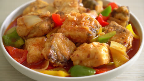 fish stew with tomato and pepper on plate