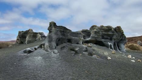 unique rock formations in an arid desert landscape