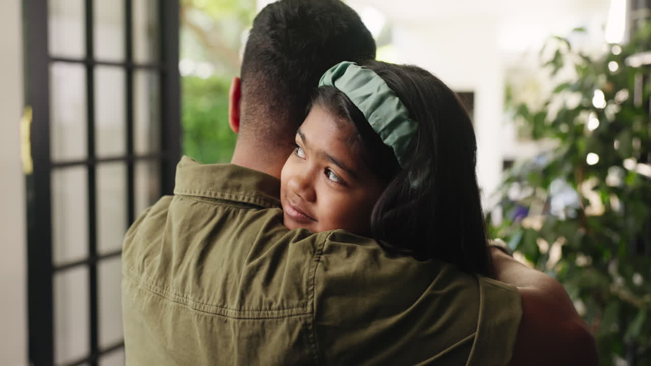 Young Girl Hugging Her Father with Affection