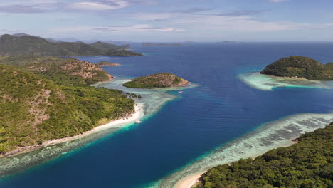 drone view of coron island, philippines, a tropical paradise featuring vibrant beaches and untouched greenery. wide aerial shot.