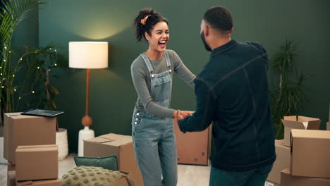 couple celebrating moving into their new home