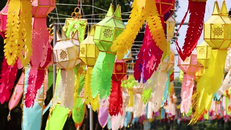 colorful paper lanterns moving in the wind