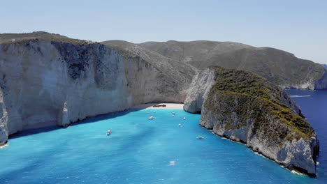 aerial: orbit shot of navagio beach in zakynthos island, greece