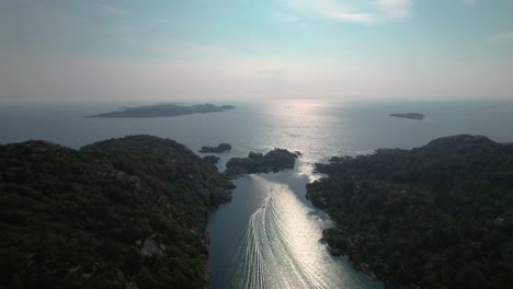 Drone-footage-of-two-boats-racing-in-a-gap-between-two-islands-south-of-Norway