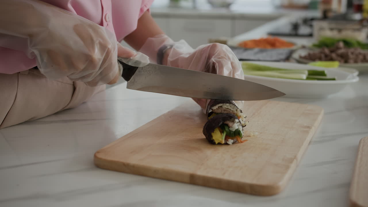 Hands of Woman Doing Gimbap for Lunch at Home