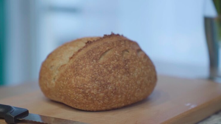Fresh loaf of bread on the table, establisher