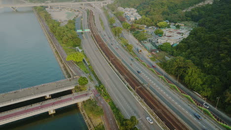aerial view of main highway traffic road in hong kong asia capital city drone fly above chinese town