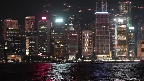 colorful lights illuminate hong kong's skyline at night