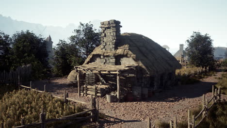 medieval cottage in a village landscape