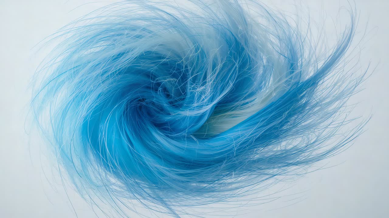 Starting frames showing blue fiber swirl rotating left at pale backdrop, showing dark core, strands