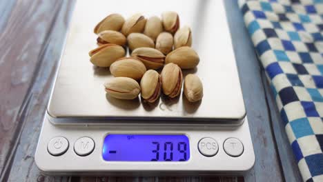 pistachios on a kitchen scale