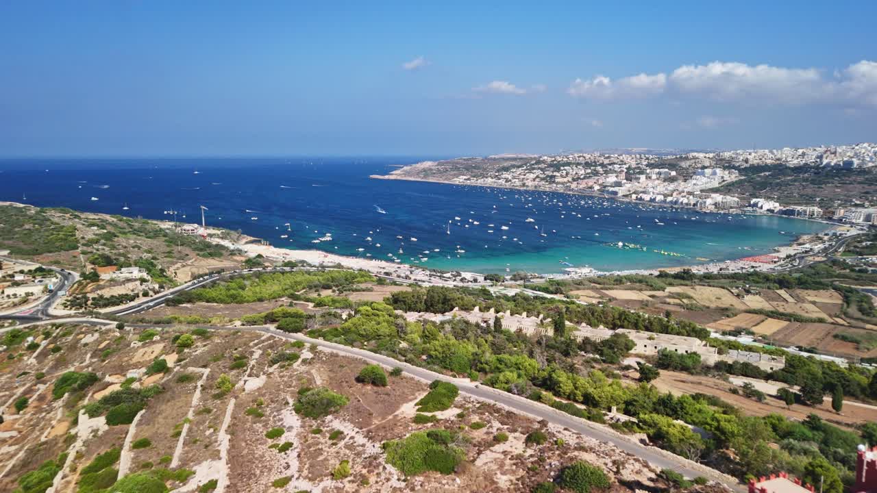 Aerial view of red fort by blue sea under clear sky, tranquil scene