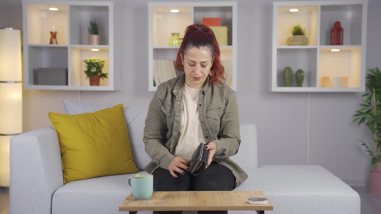 Penniless woman with empty pockets.