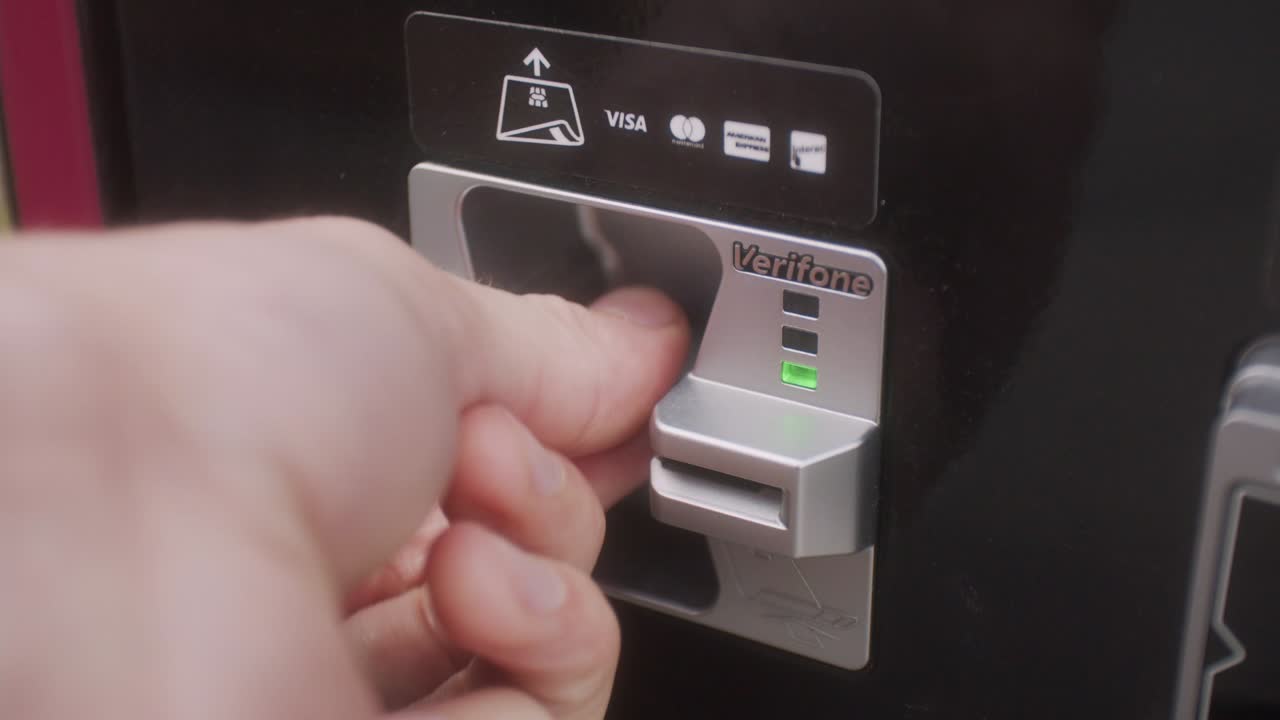 Credit card inserting into parking machine for payment