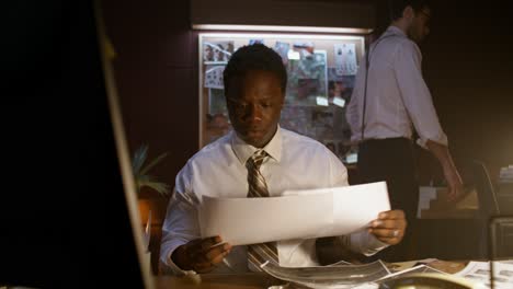 detective reviewing evidence