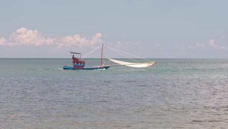 static shot of shrimp boat fishing for small shrimp in the gulf of thailand