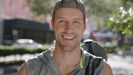 portrait-of-attractive-fit-young-man-wearing-sportswear-smiling-happy-cheerful-enjoying-city-lifestyle