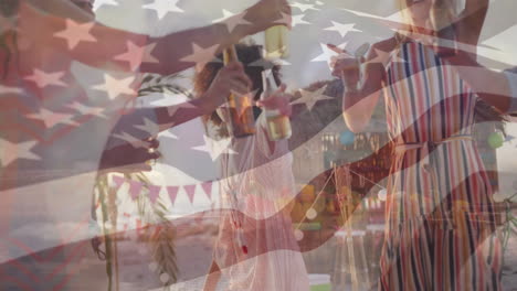 american flag animation over friends celebrating with drinks at beach party