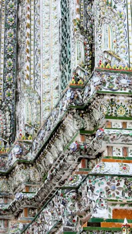 close-up views of wat arun's ornate architecture