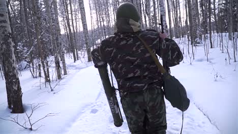 soldier in winter forest