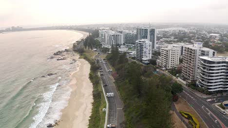 hotel buildings and roads at the sandy coastline of mooloolaba beach in qld, australia