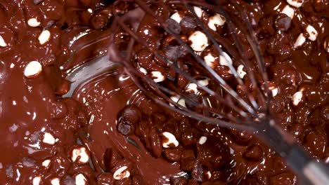 whisking chocolate and white chips together smoothly