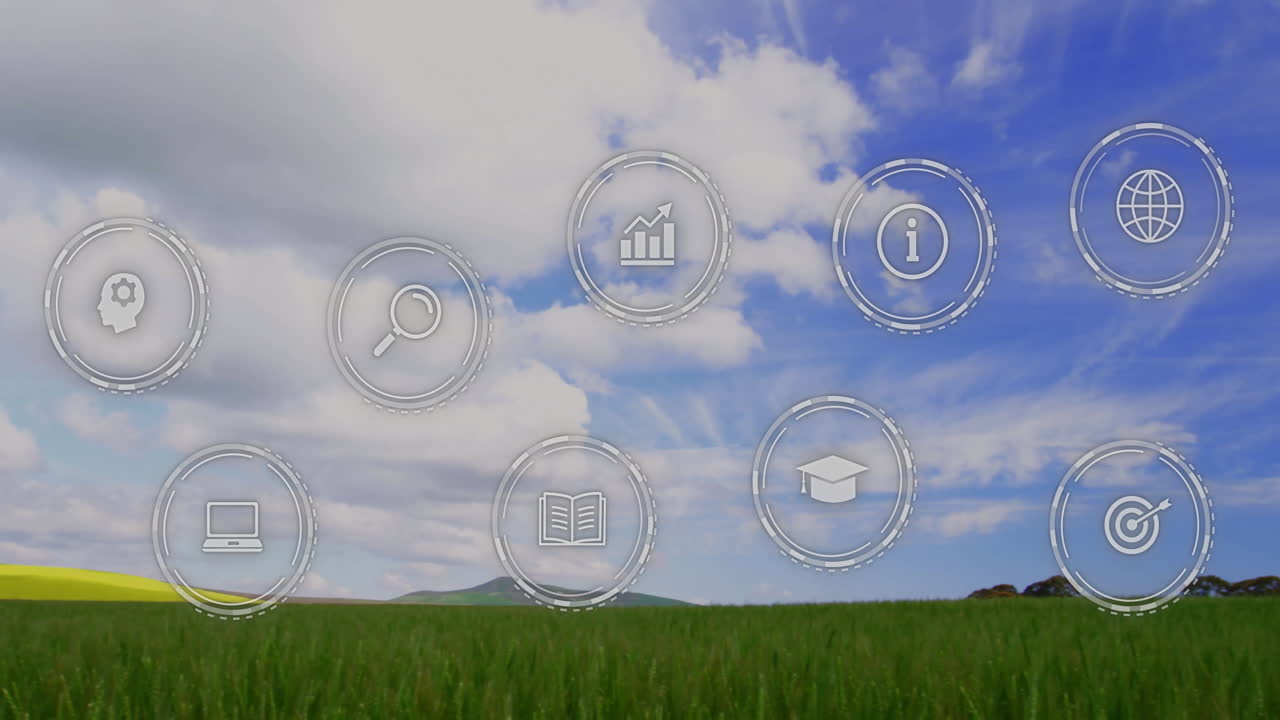 Animation of icons overlaying grassy landscape with blue sky in background