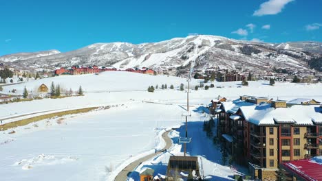 empty chairlift at steamboat ski resort in steamboat springs, colorado