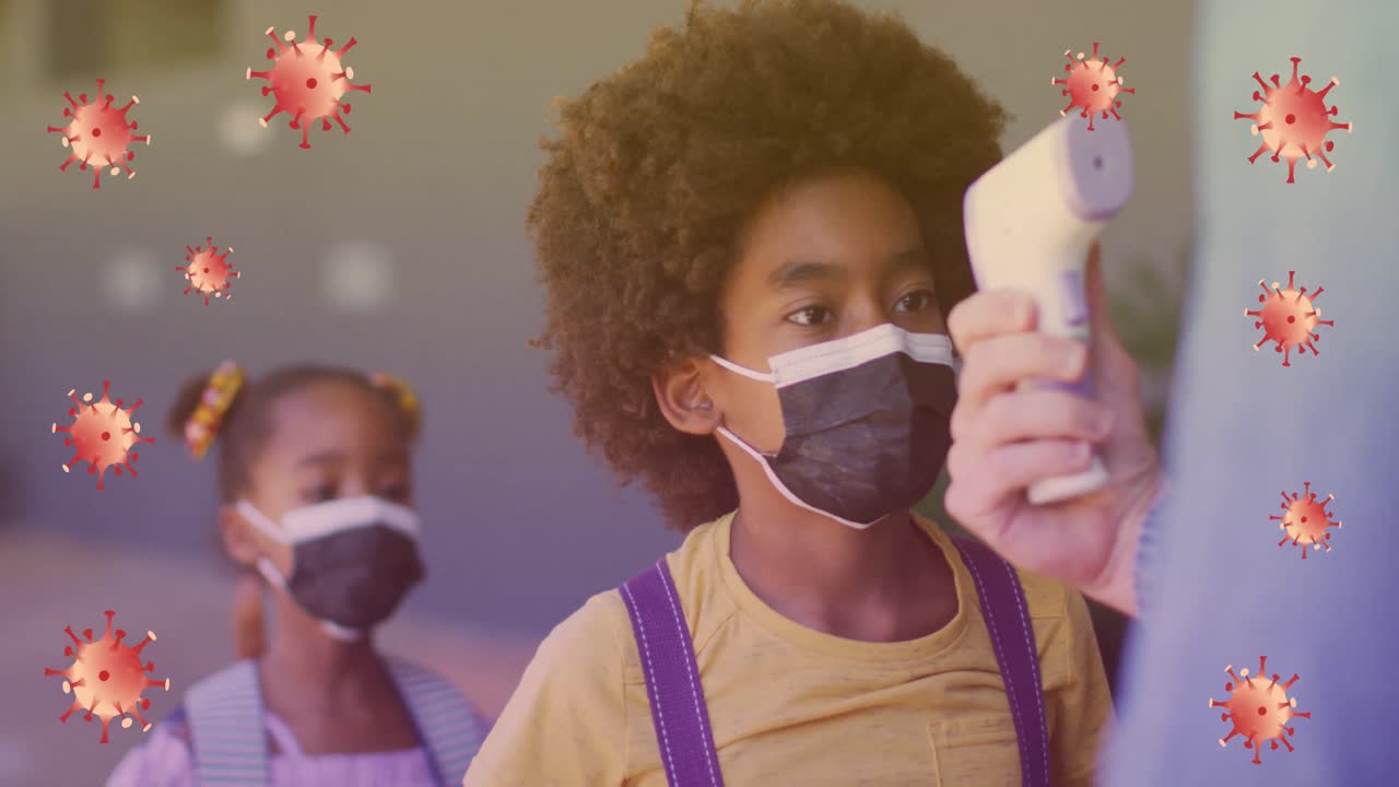 Animation of virus cells over caucasian woman checking temperature to pupils in face masks