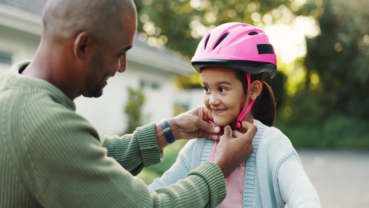 Father, daughter and teaching with bicycle