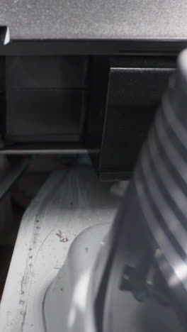 inner view of vintage videocassette recorder mechanism in studio extreme close view. old equipment for playing video. retro domestic technology